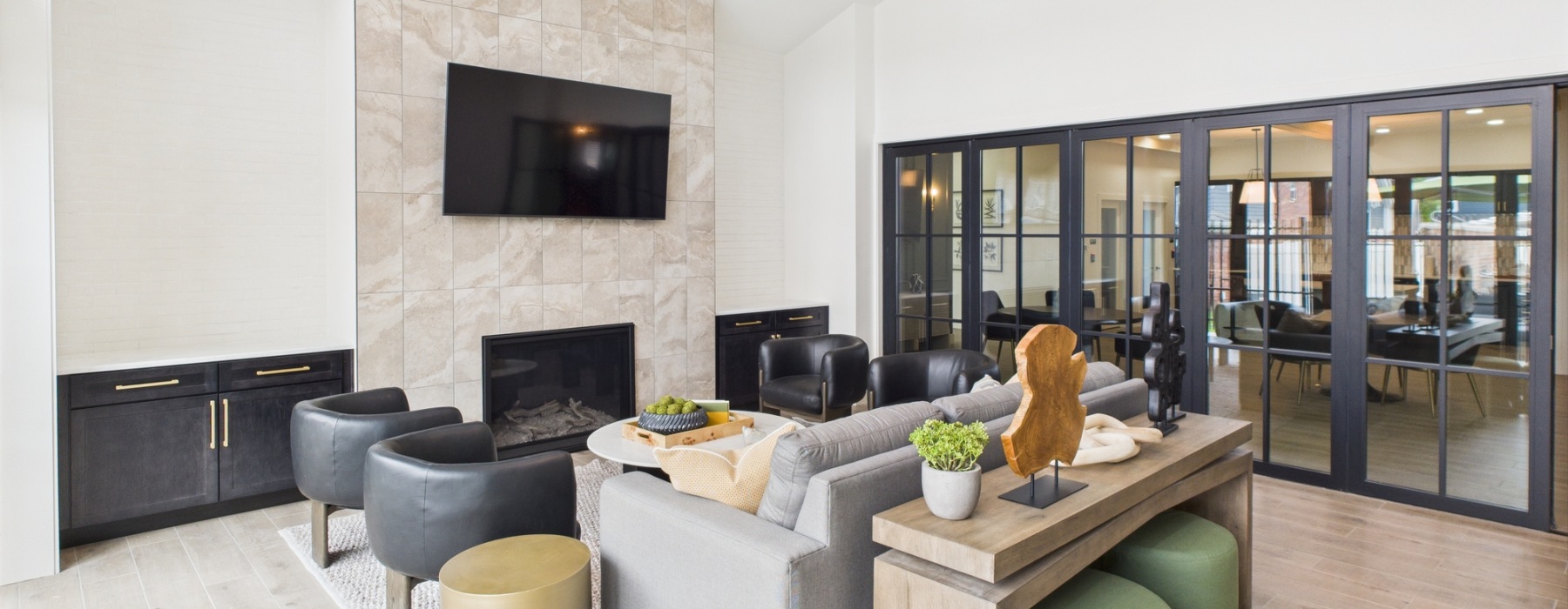 Clubhouse lounge room with tv and fireplace